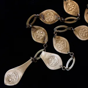 A 1930s EGYPTIAN REVIVAL CELLULOID SEGMENTED BELT