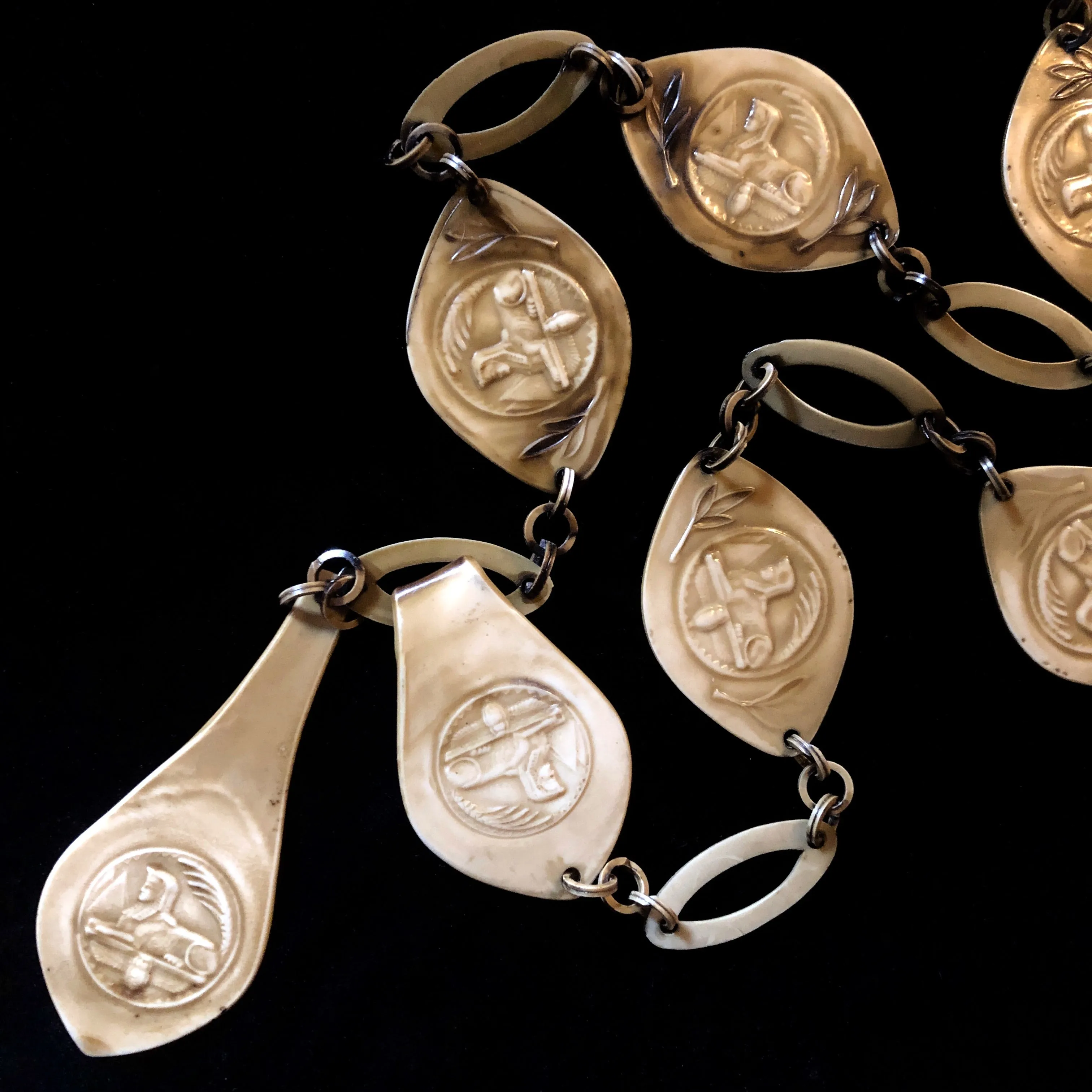 A 1930s EGYPTIAN REVIVAL CELLULOID SEGMENTED BELT