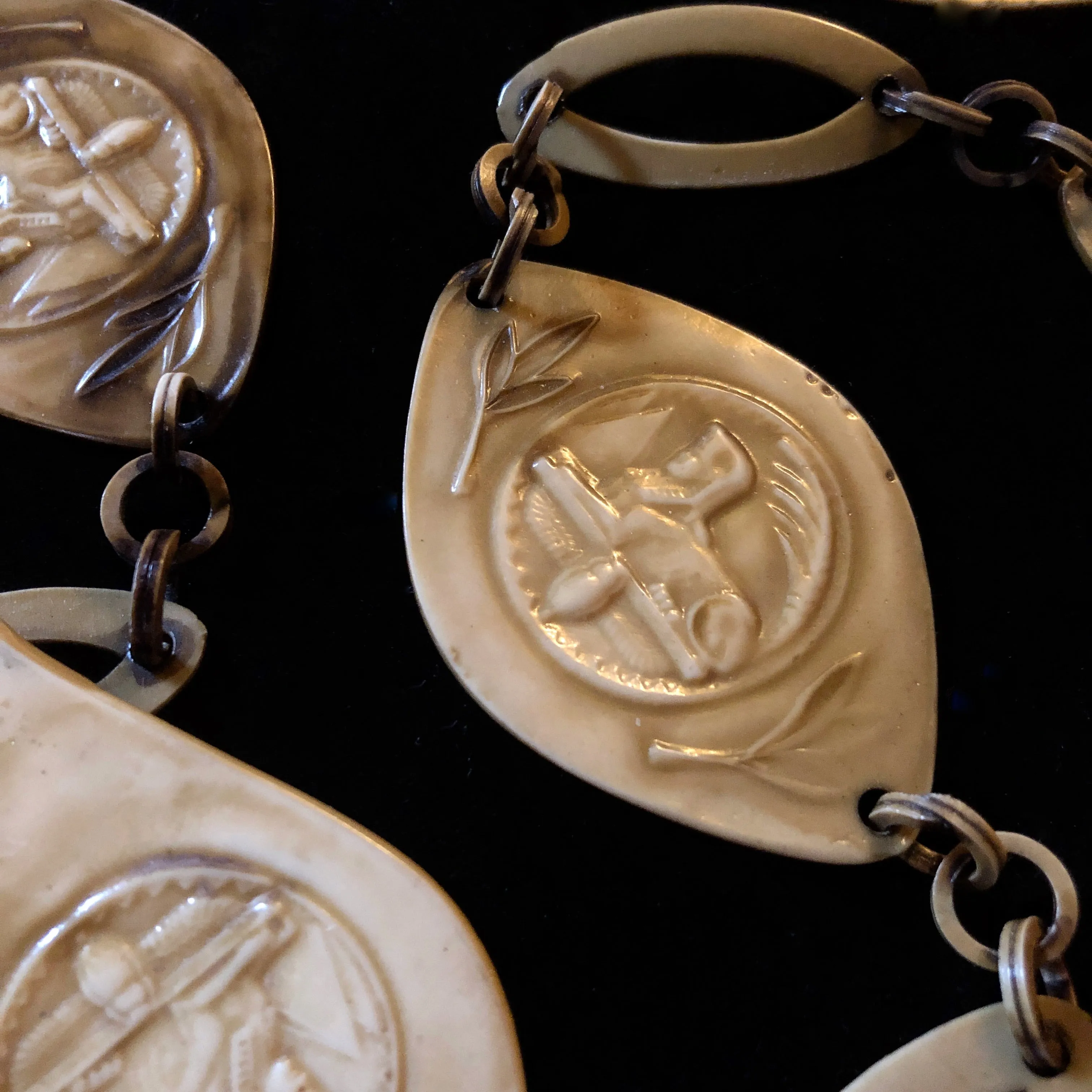 A 1930s EGYPTIAN REVIVAL CELLULOID SEGMENTED BELT
