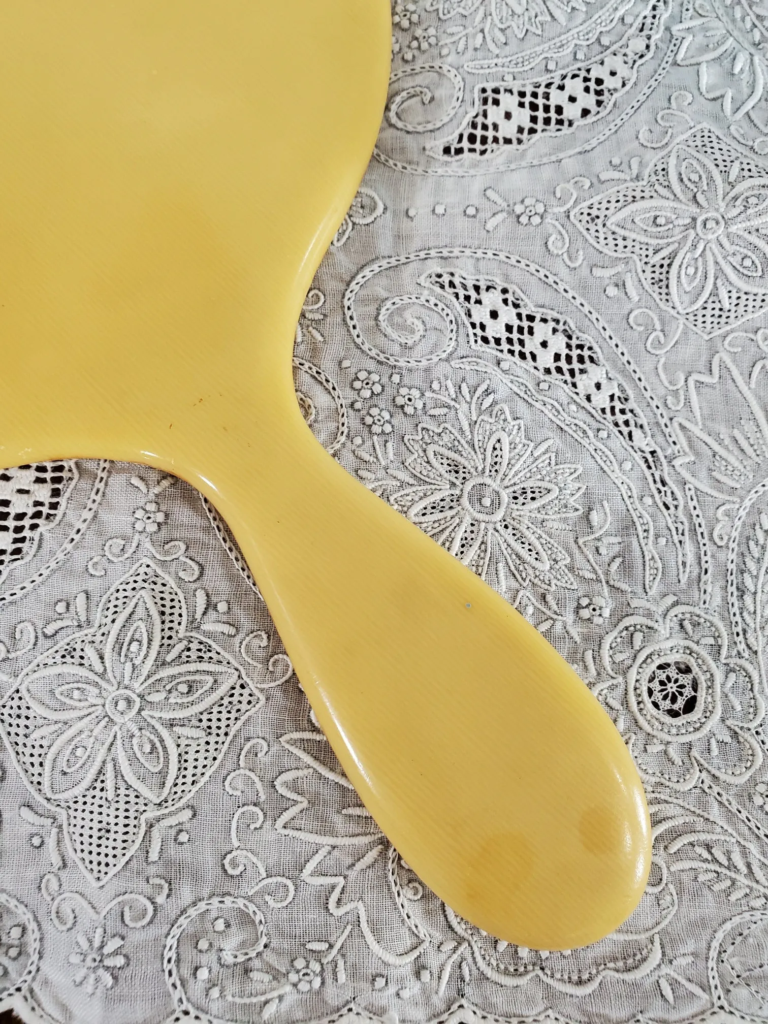 Antique Yellow Faux-Ivory Pyralin Hand Mirror