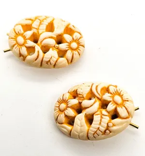 Molded pierced celluloid off-white flower pair of vintage barrettes mid century