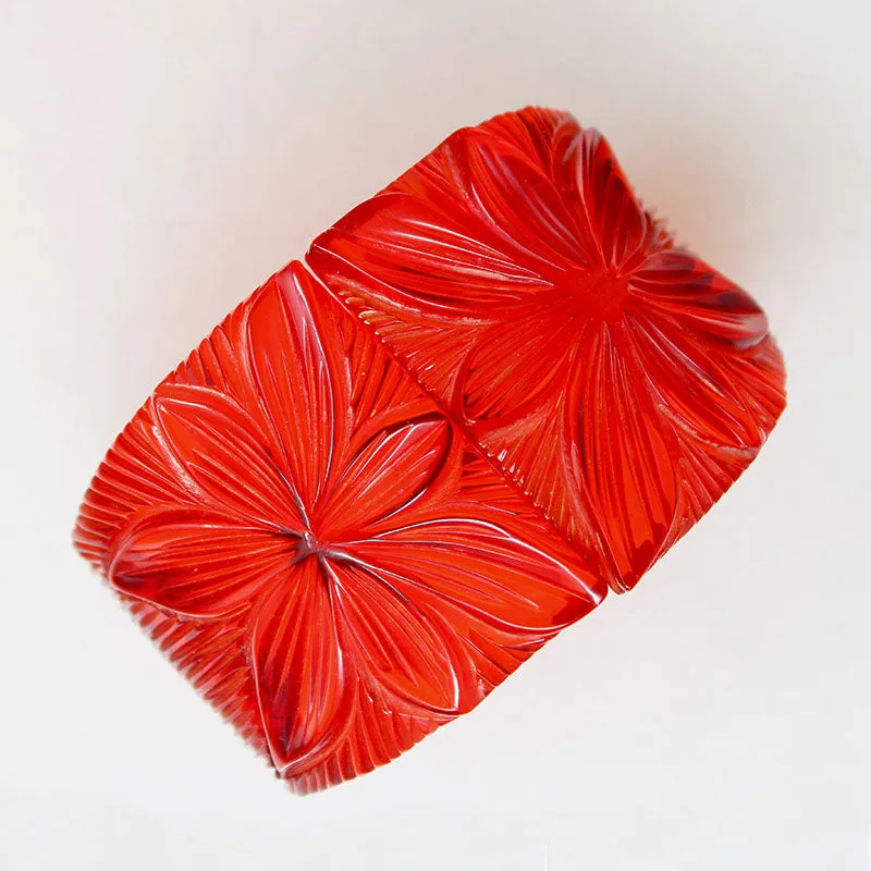 Polynesian Motif Red Bakelite Clamper Bracelet