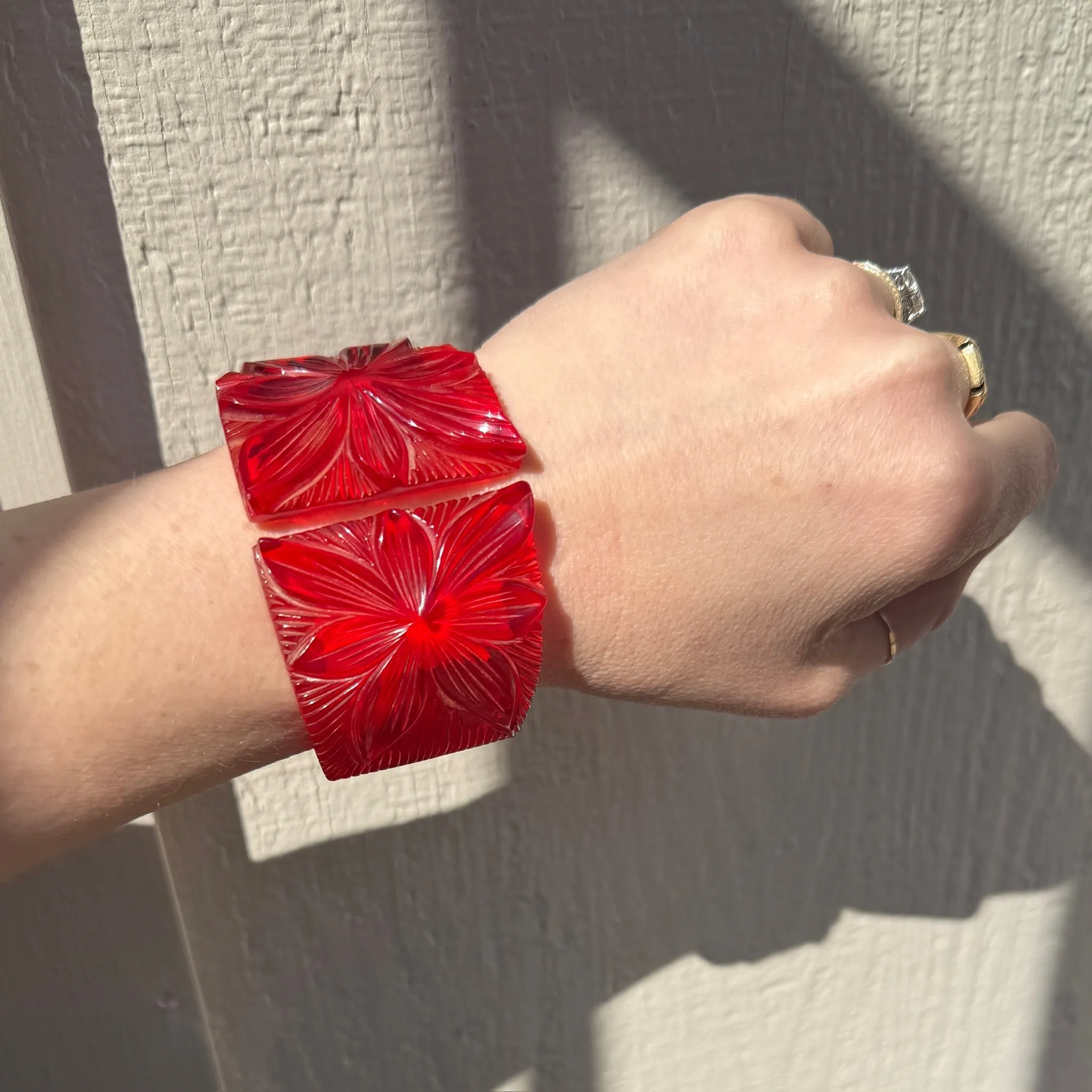 Polynesian Motif Red Bakelite Clamper Bracelet