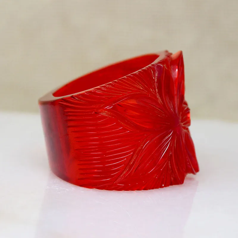 Polynesian Motif Red Bakelite Clamper Bracelet