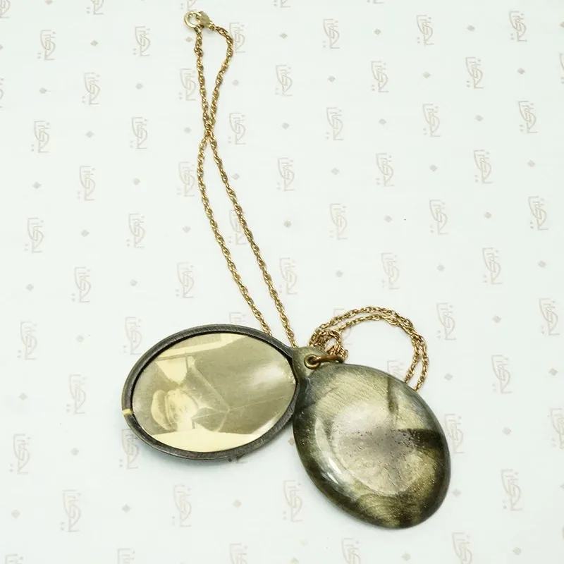 Shimmering Green Celluloid Sliding Locket
