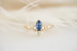The Aurora Ring - 0.68 CT Blue Marquise Sapphire