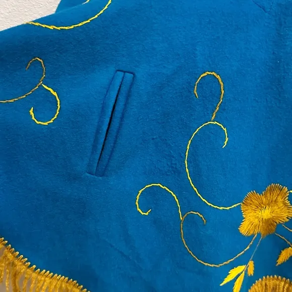 Vintage 70’s Blue Felt Boho Poncho with yellow floral embroidery and fringe. 😍