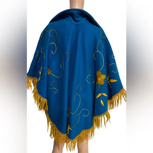 Vintage 70’s Blue Felt Boho Poncho with yellow floral embroidery and fringe. 😍