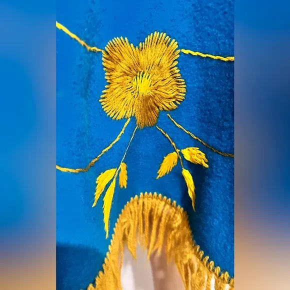 Vintage 70’s Blue Felt Boho Poncho with yellow floral embroidery and fringe. 😍
