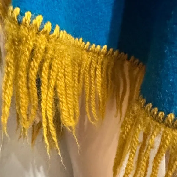 Vintage 70’s Blue Felt Boho Poncho with yellow floral embroidery and fringe. 😍